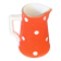 Milk jug, pitcher with white polka dots on orange earthenware, Sarreguemines and Digoin