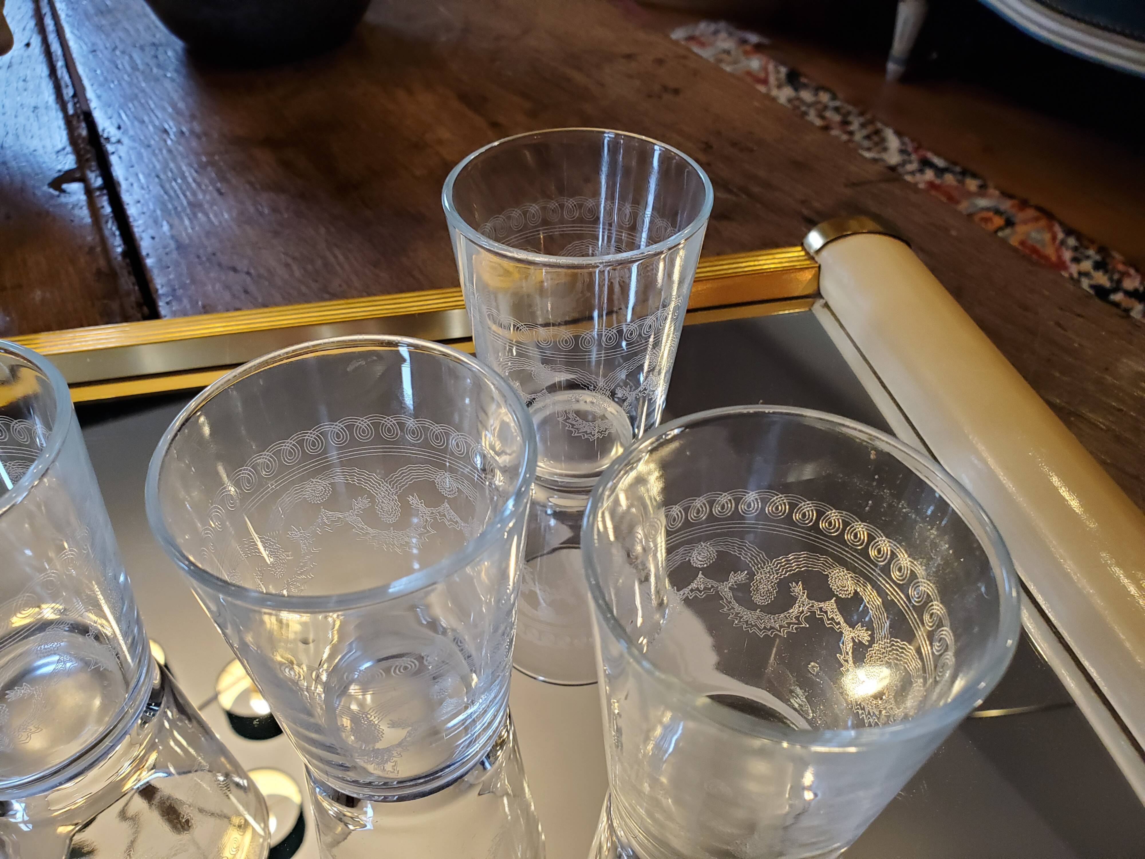 4 chiseled water glasses decoration arabesques and scrolls