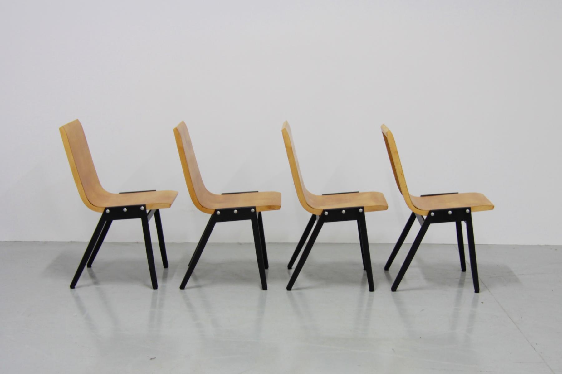 Set de 4 chaises empilables par Roland Rainer
