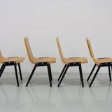 Set of 4 stacking chairs by Roland Rainer