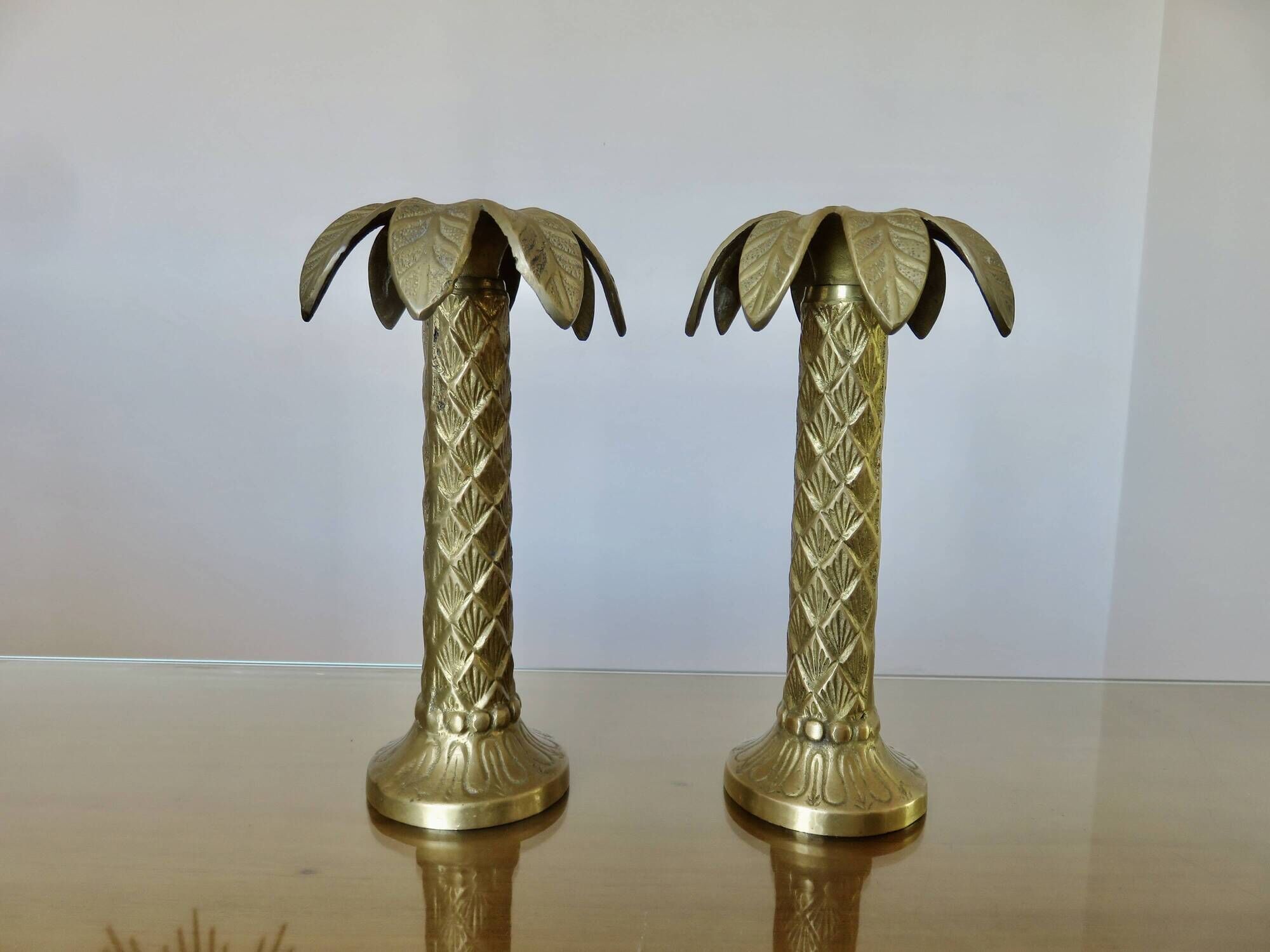 Pair of "palm tree" candlesticks in solid gilded brass, 1970