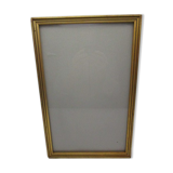 Old wooden and gilded stucco frame