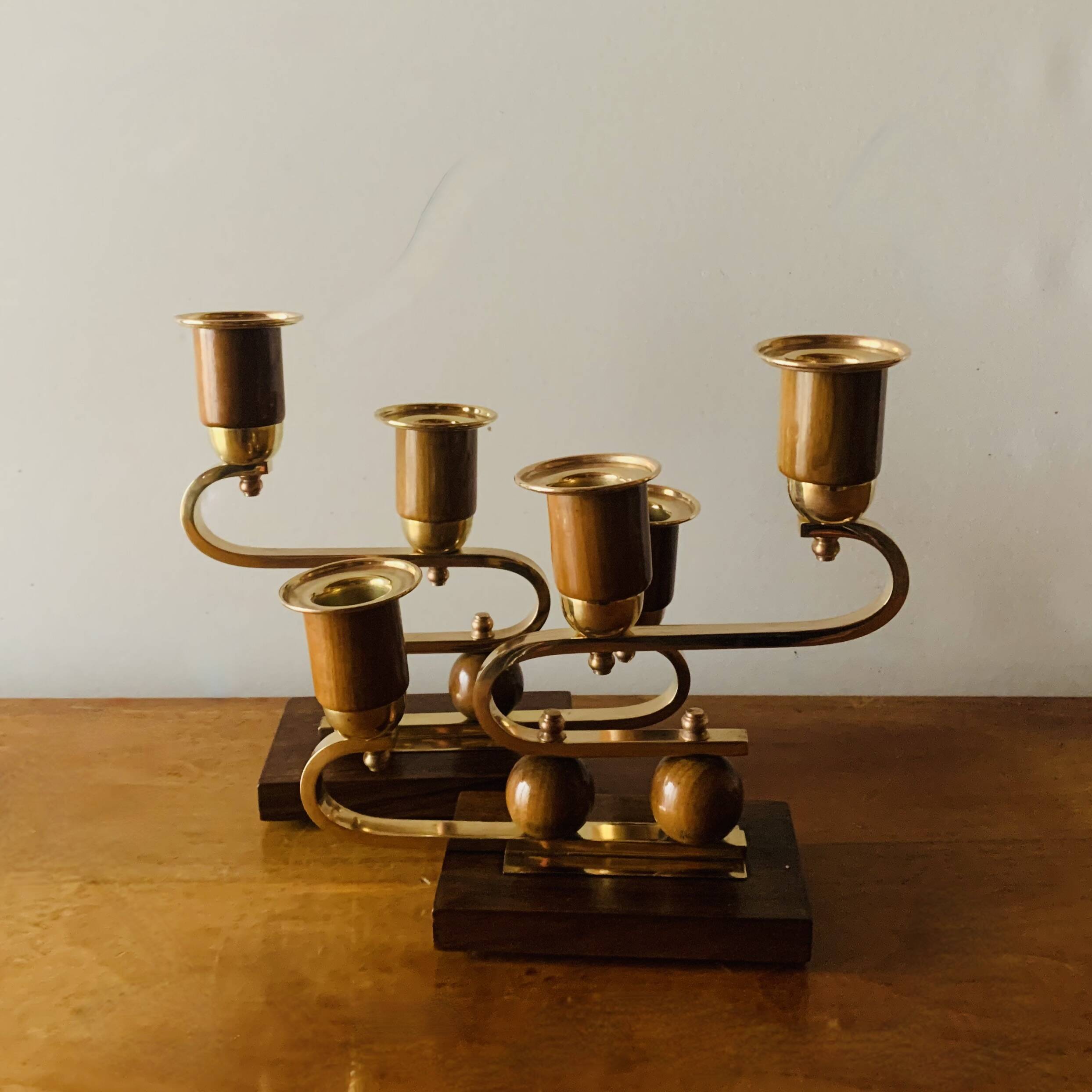 Pair of Art Deco candlesticks in gilded brass and wood