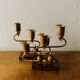 Pair of Art Deco candlesticks in gilded brass and wood