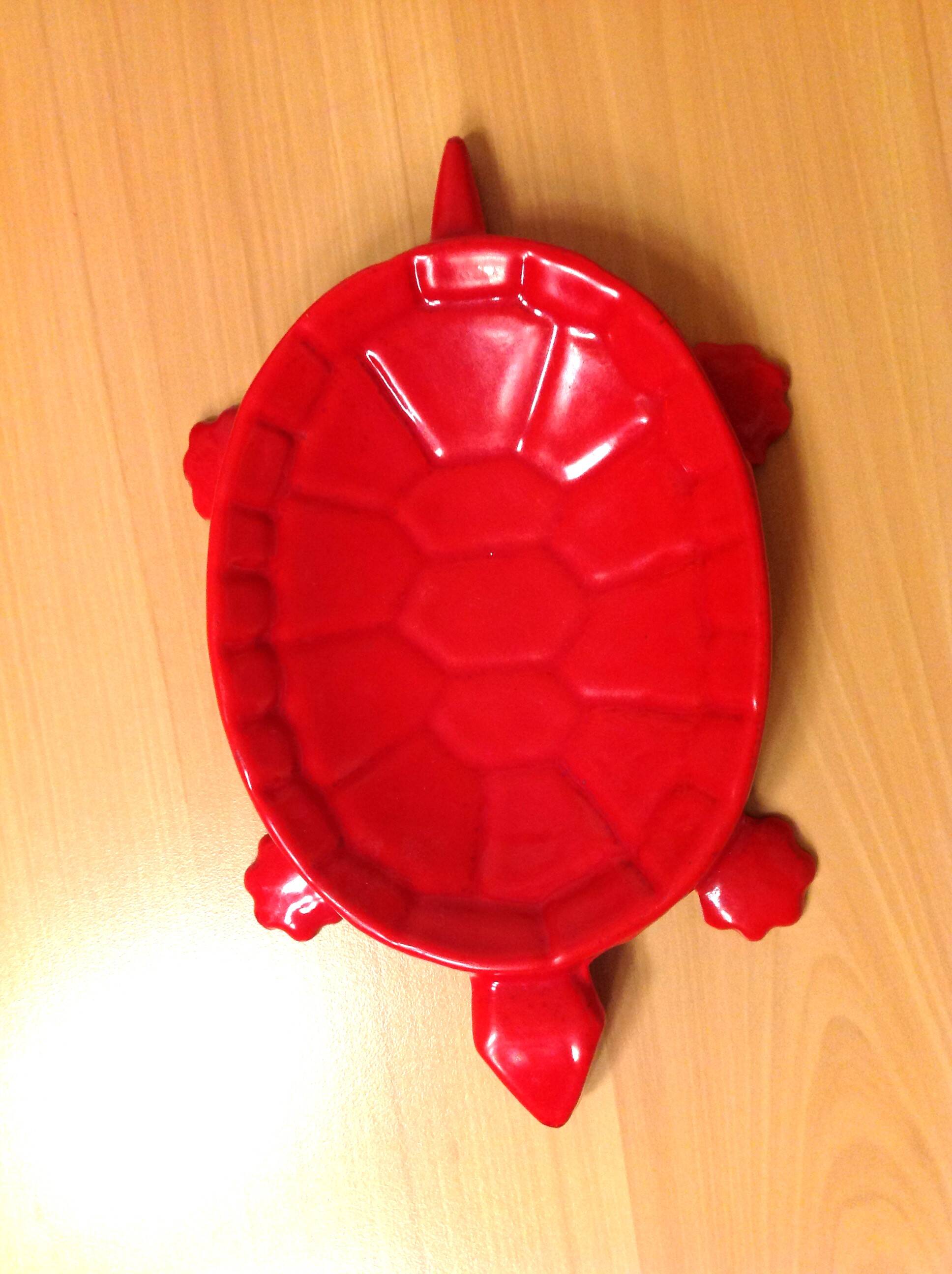 Turtle pocket emptier in enameled red cast iron by Castirone France