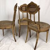 Series of three Louis XVI style chairs in gilded wood, circa 1900
