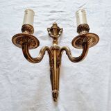 French Empire-style wall sconce or chandelier in bronze with an antique gold patina.