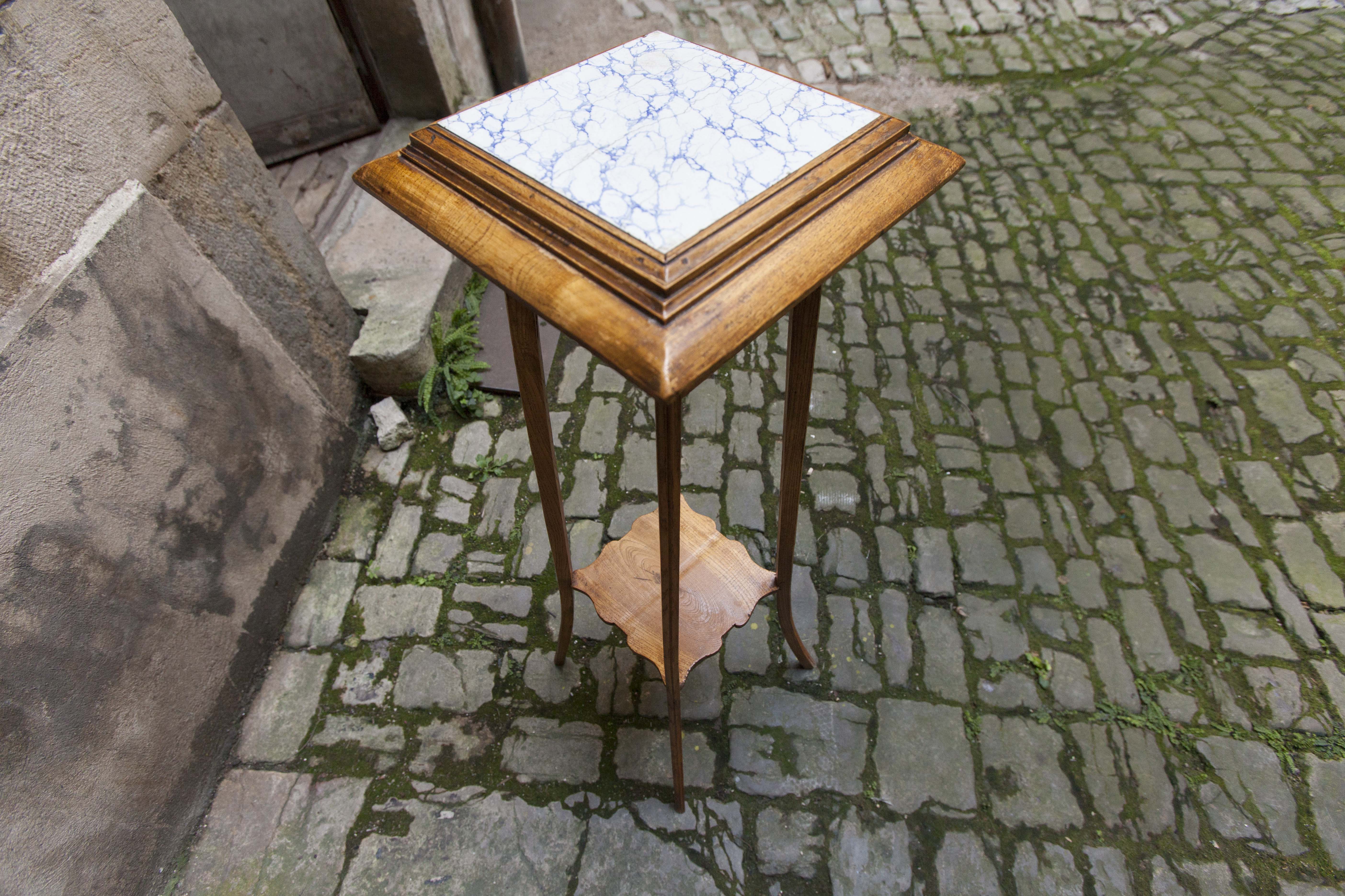 Wooden and ceramic sellette, 1920