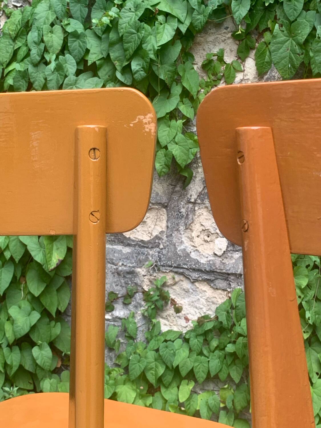 Pair of caramel bistro chairs 1950