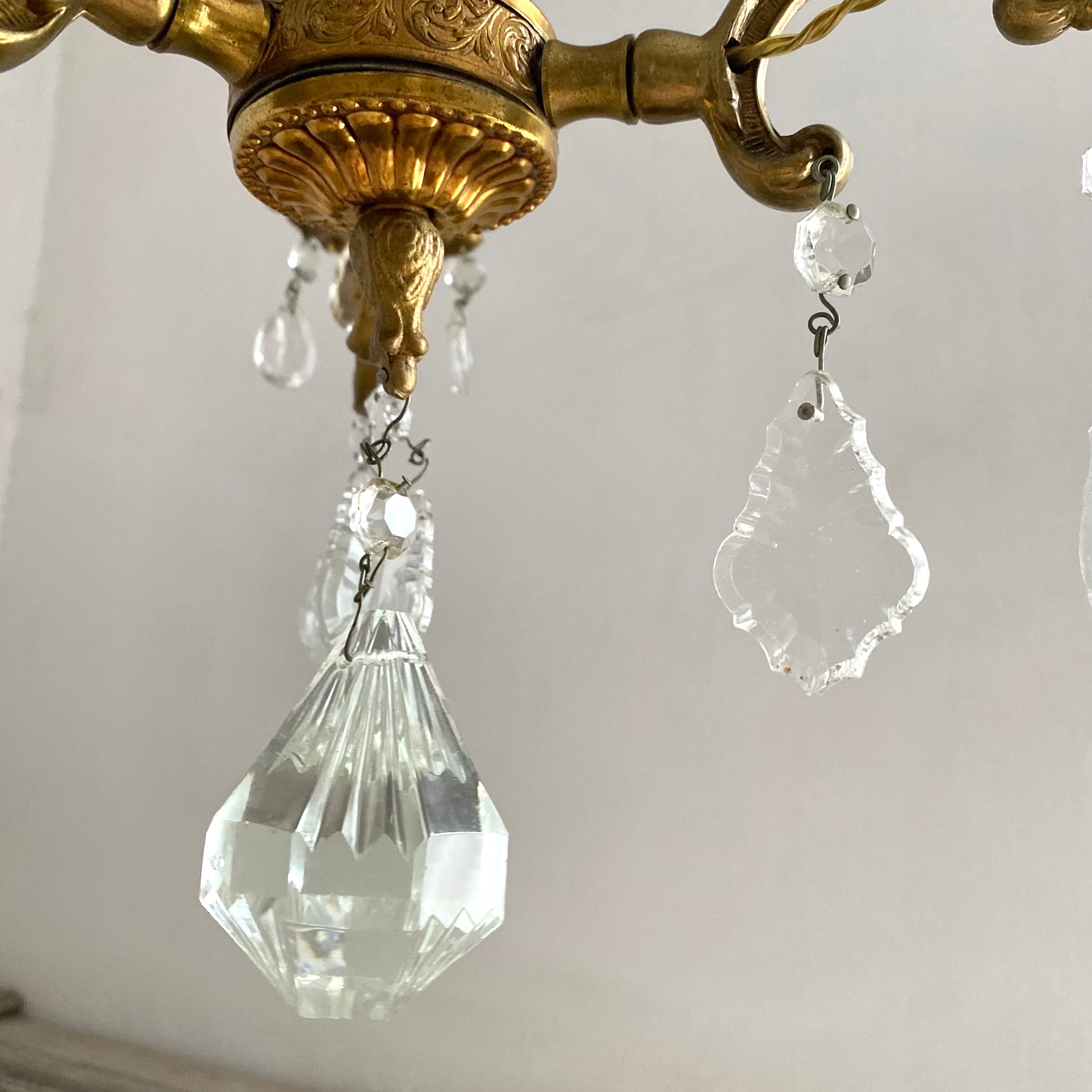 Chandelier with tassels and brass