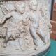 Round white stone pot cover with a farandole of angels