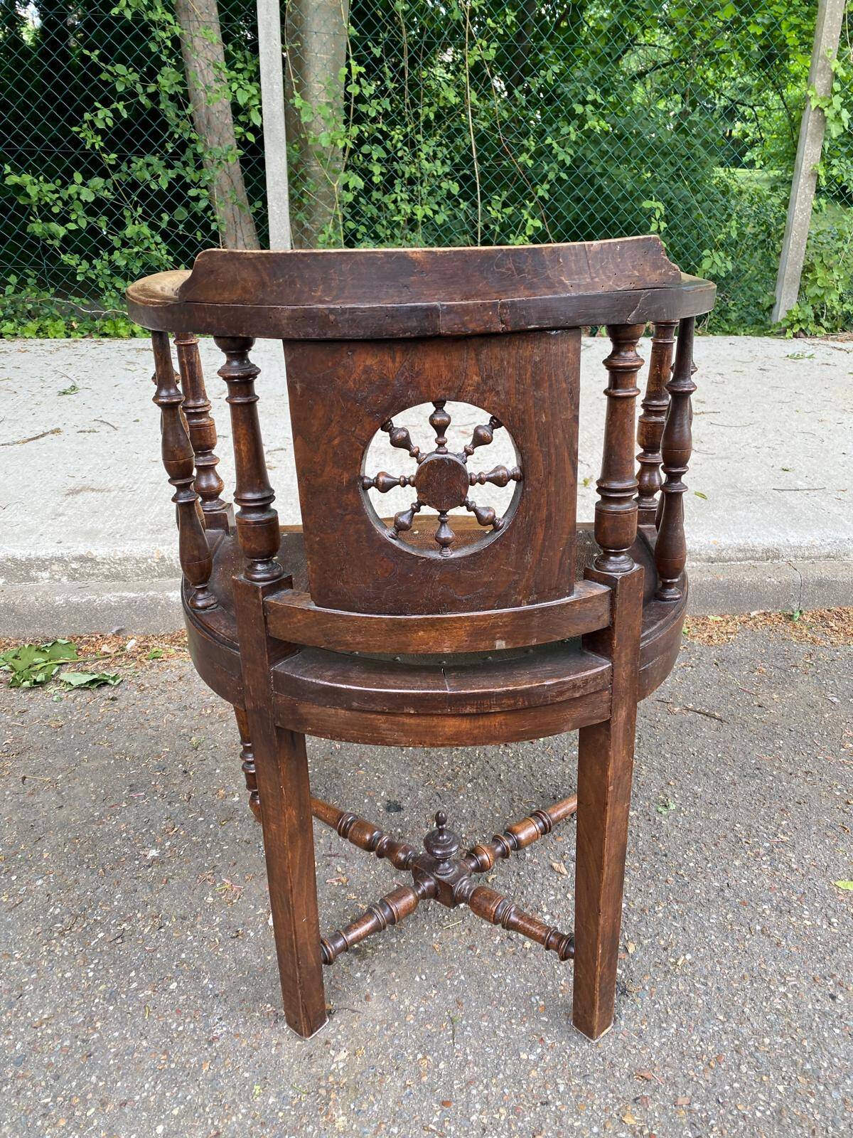 18th century Breton office chair in solid curved and carved wood