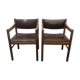 2 chaises en bois de cuir
