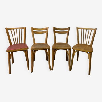 Series of 4 mismatched Baumann chairs