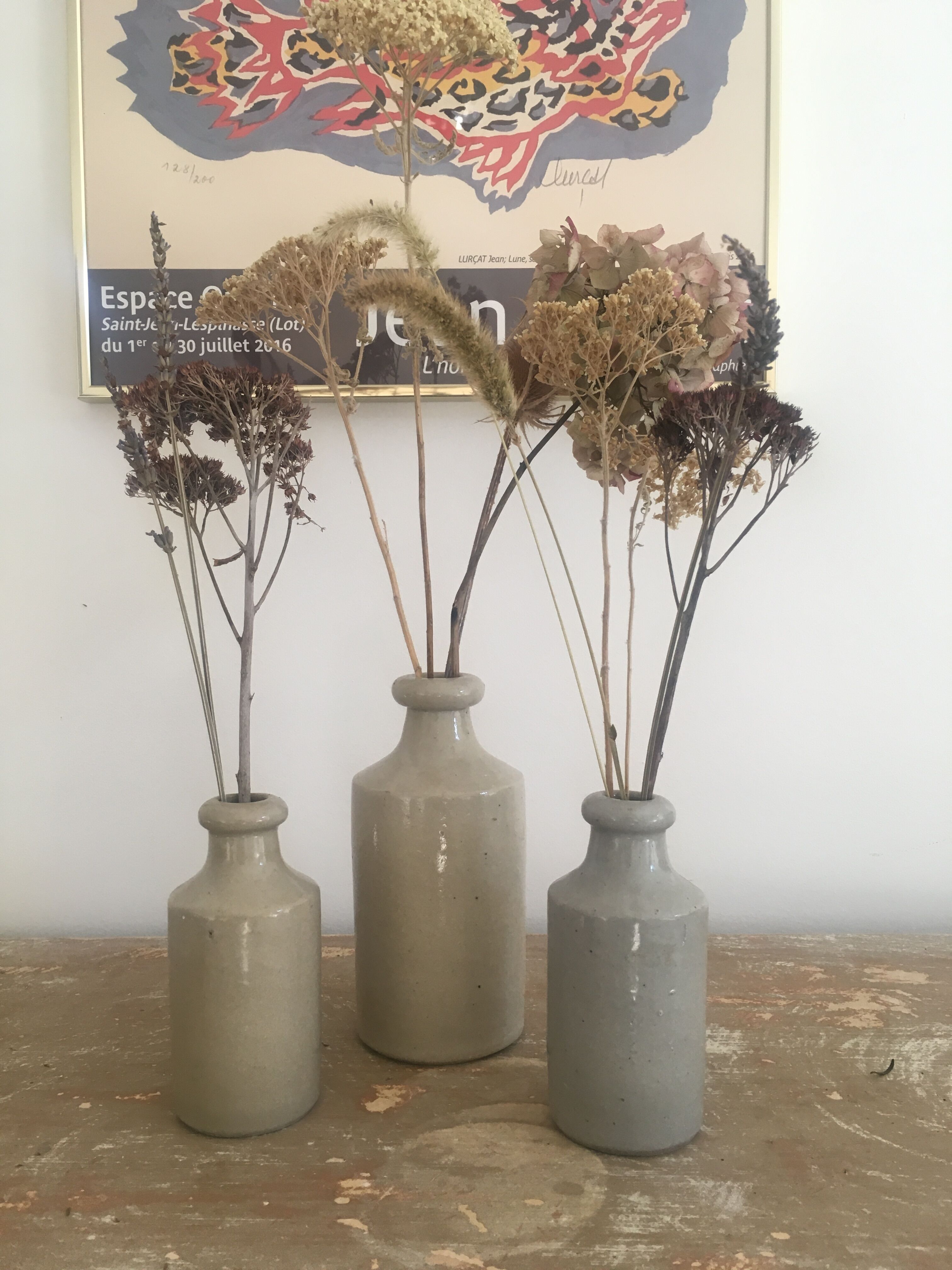 Three bottles of Mercure Bourdon Frères Paris sandstone