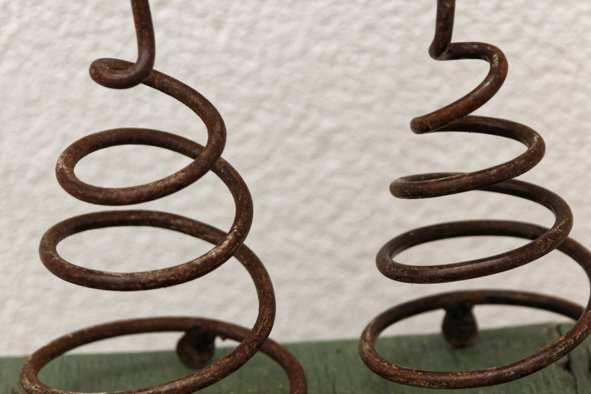 Pair of wrought iron spiral candlesticks