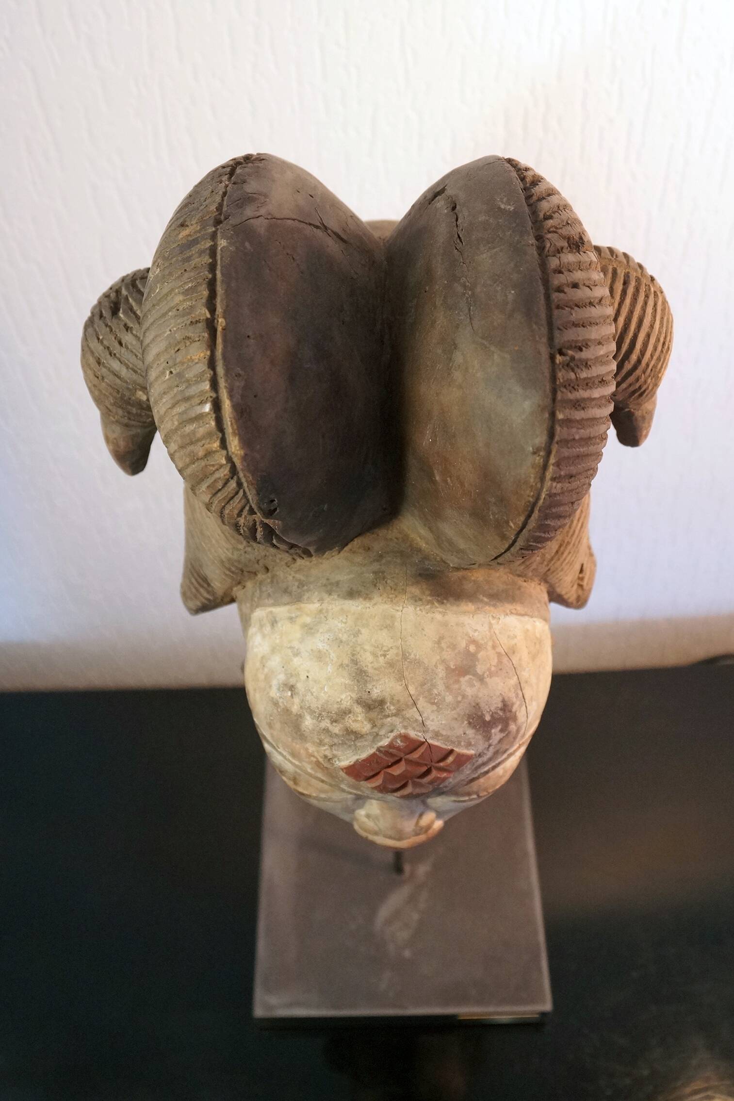 Punu mask on a base