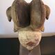 Punu mask on a base