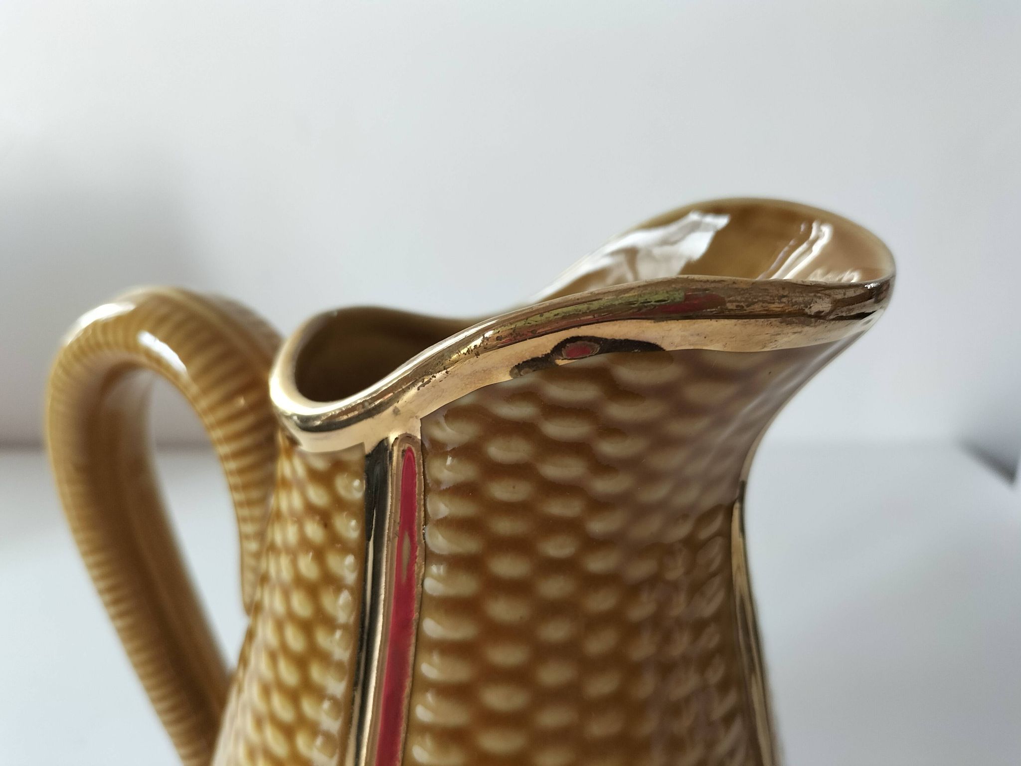 Corn cob slipware jug – gilded highlights