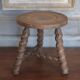 Vintage stool, old wooden stool, tripod stool