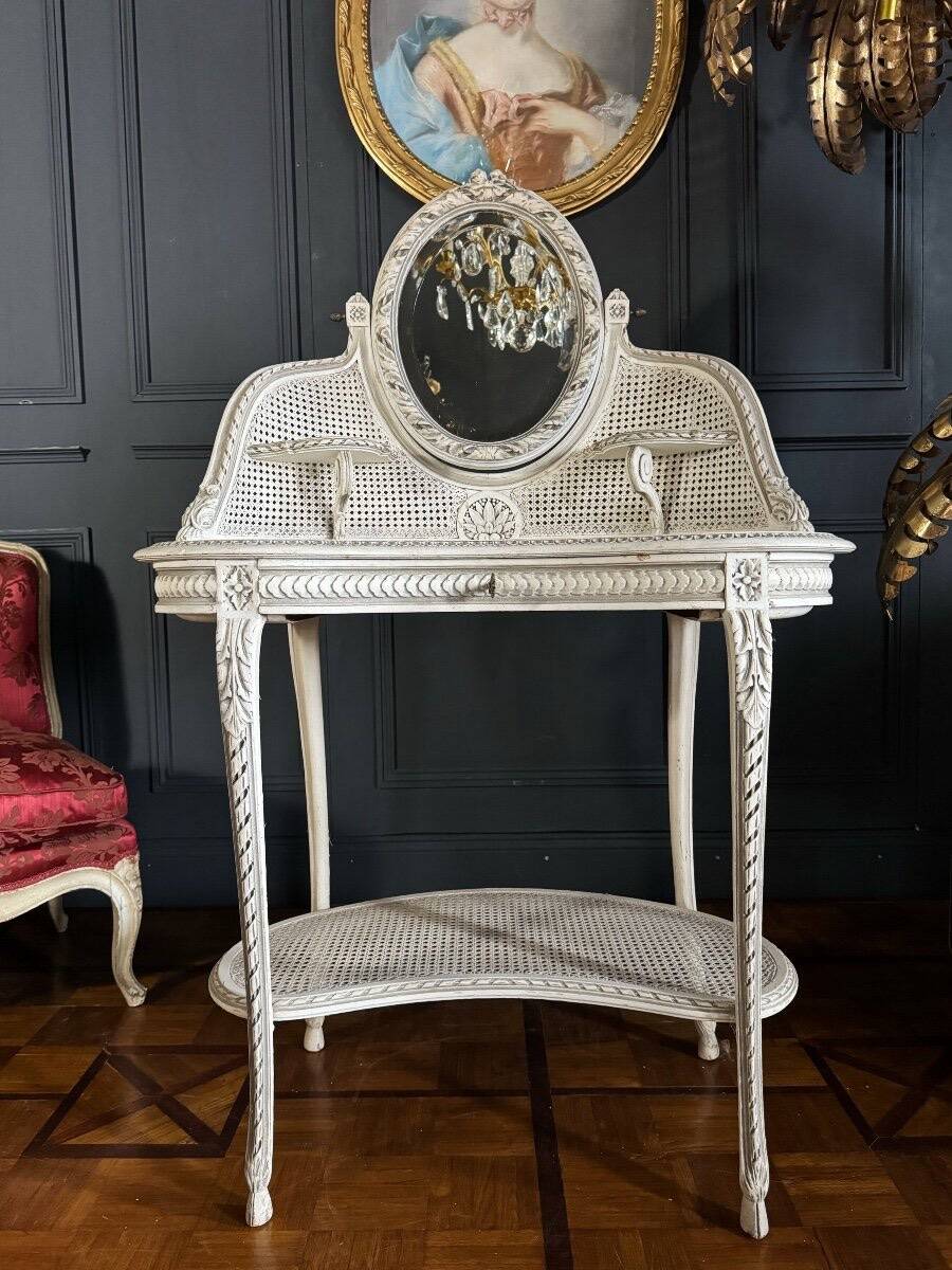 Coiffeuse du XIXe en bois peint et cannage de style Louis XVI