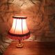 Vintage lamp, pink fringed pagoda shade and brass base.
