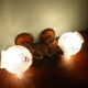 Wall lamps in wood and gilded metal, openwork glass lampshade