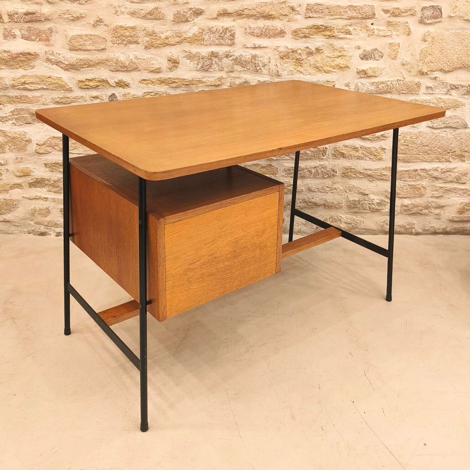 Modernist desk with suspended drawer unit, French work from the 1950s.