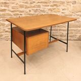 Modernist desk with suspended drawer unit, French work from the 1950s.