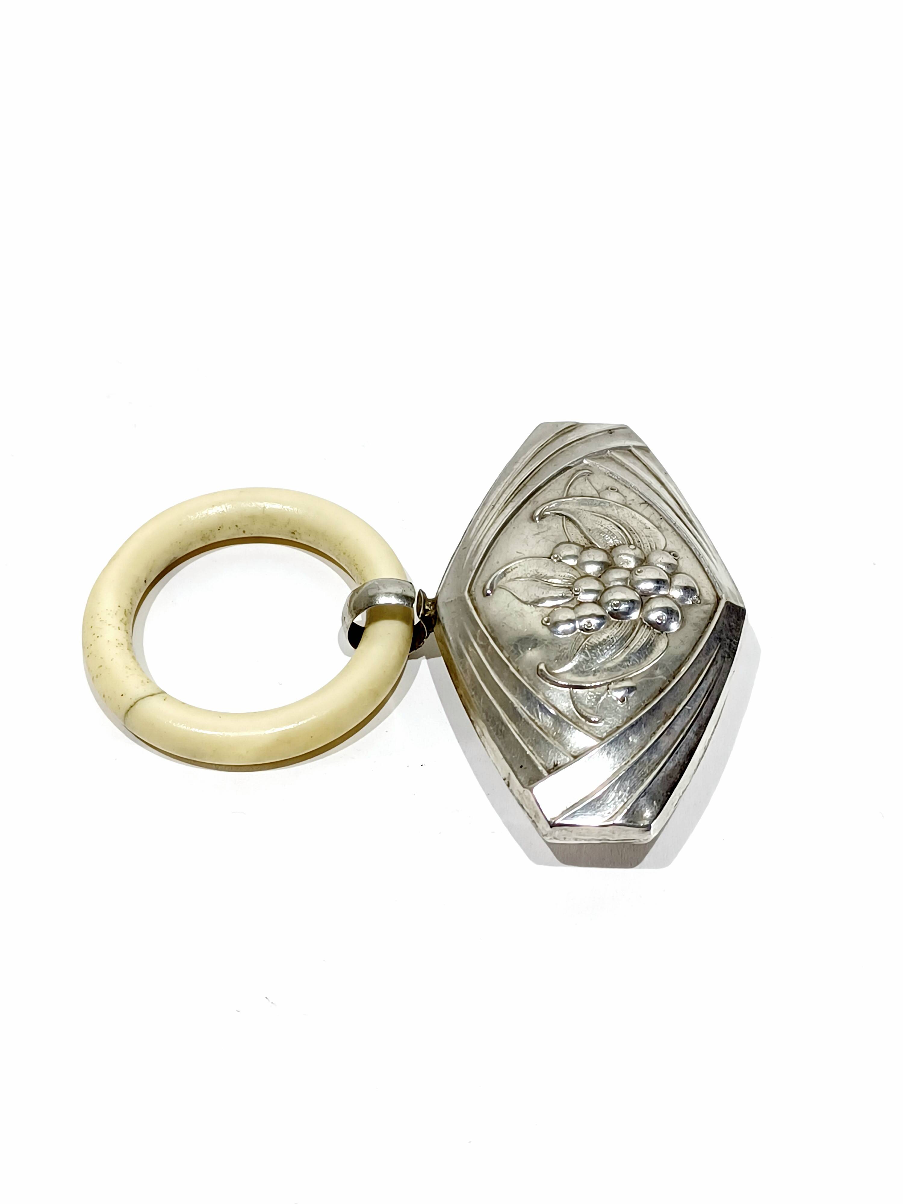 Solid silver rattle