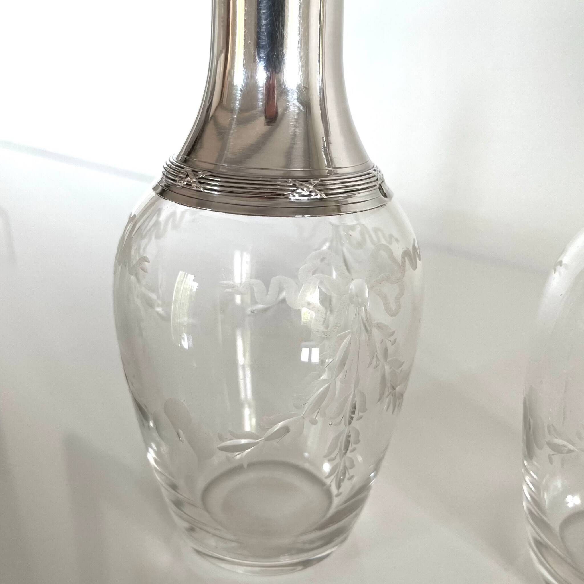 Pair of crystal and silver decanters - early 20th century