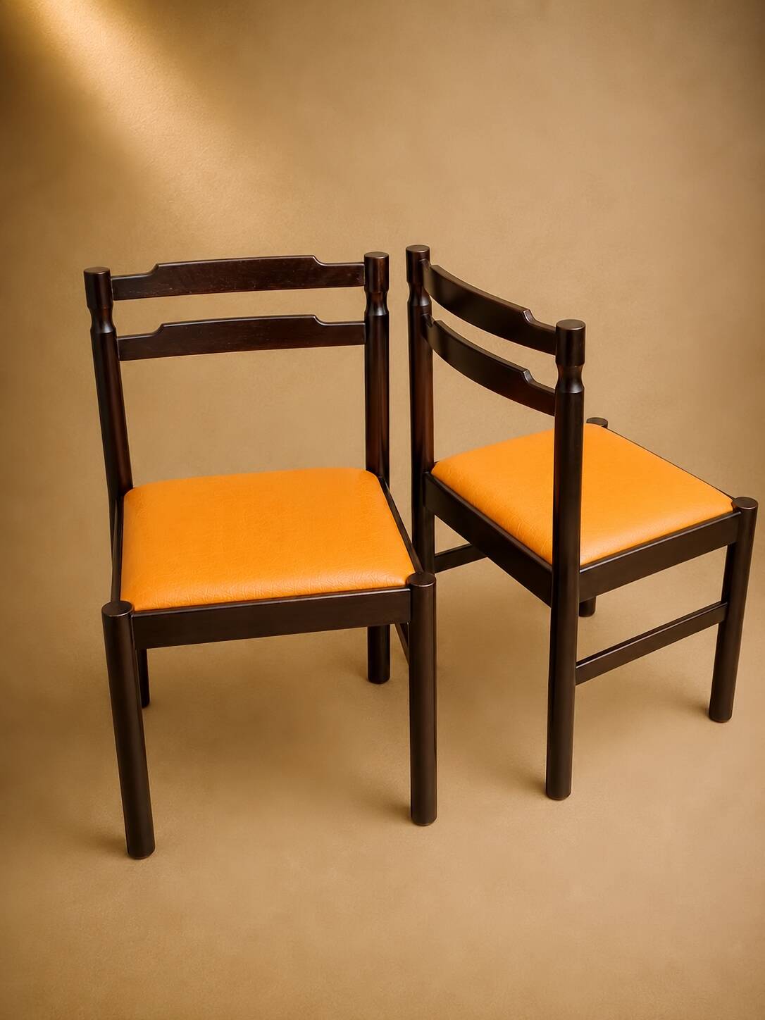 Set of 4 Mid-century beech / faux leather chairs.