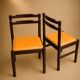 Set of 4 Mid-century beech / faux leather chairs.