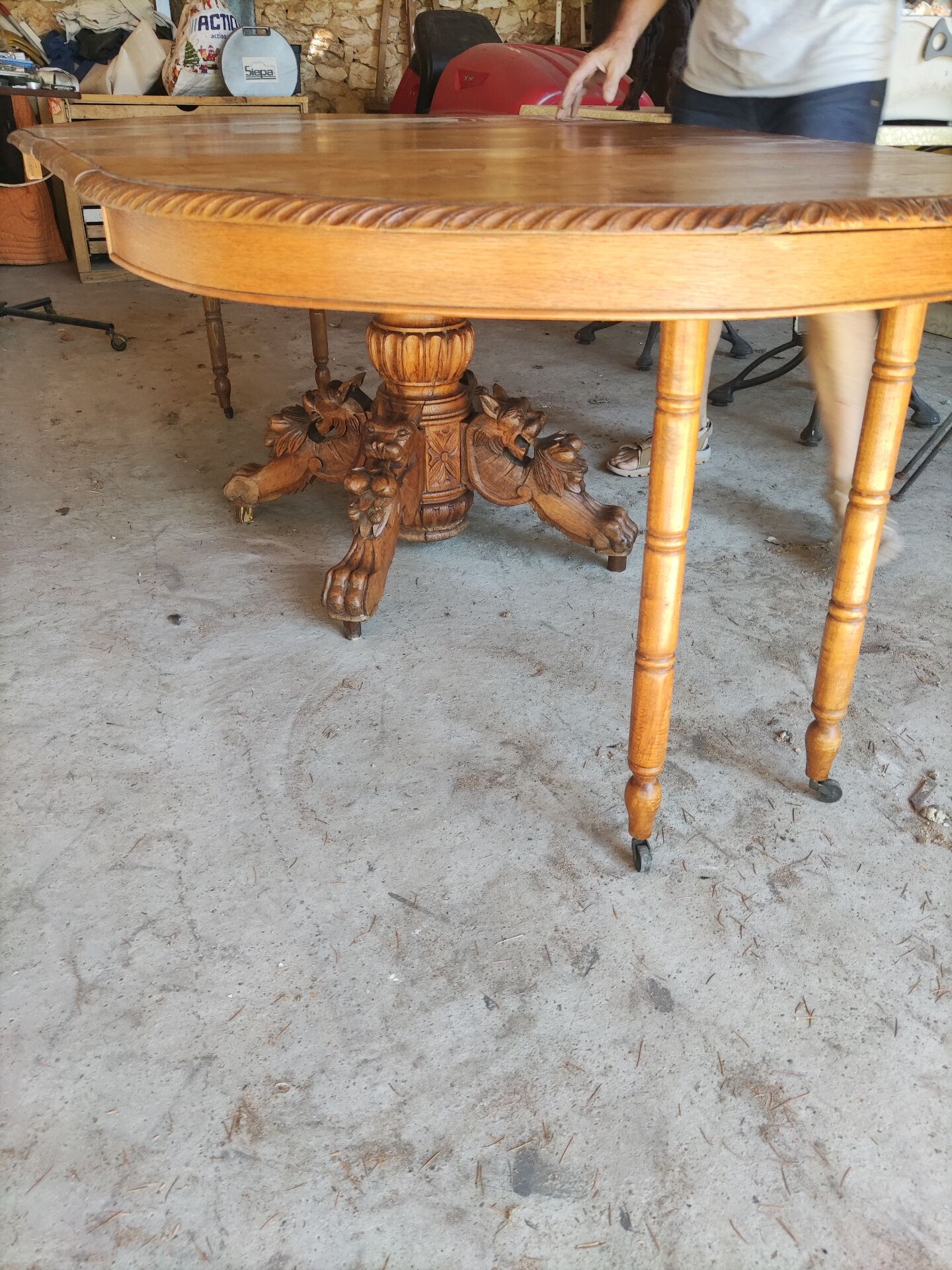 Oval oak table with carved details - known as a hunting table.