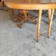 Oval oak table with carved details - known as a hunting table.