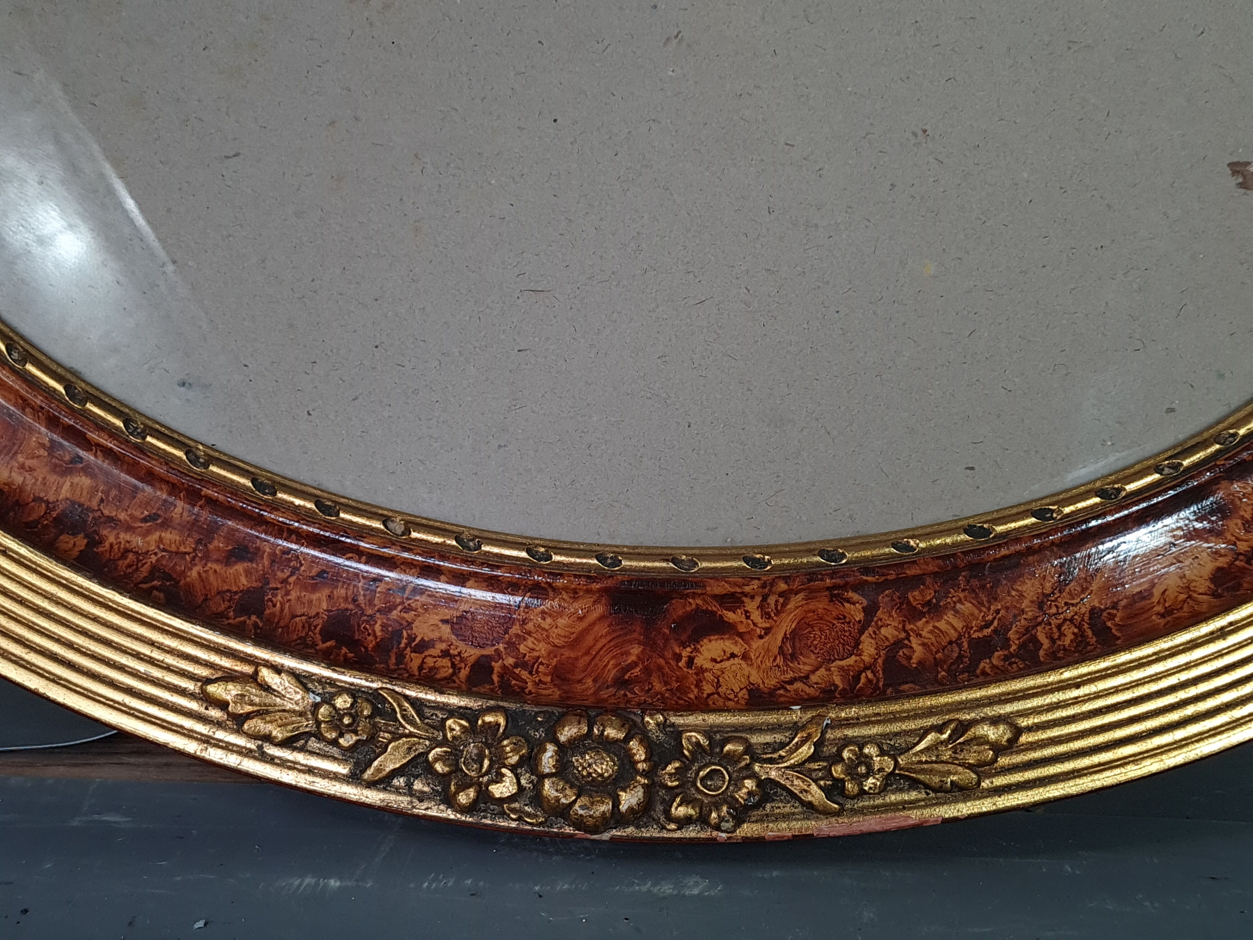 Old oval frame gilded stucco wood