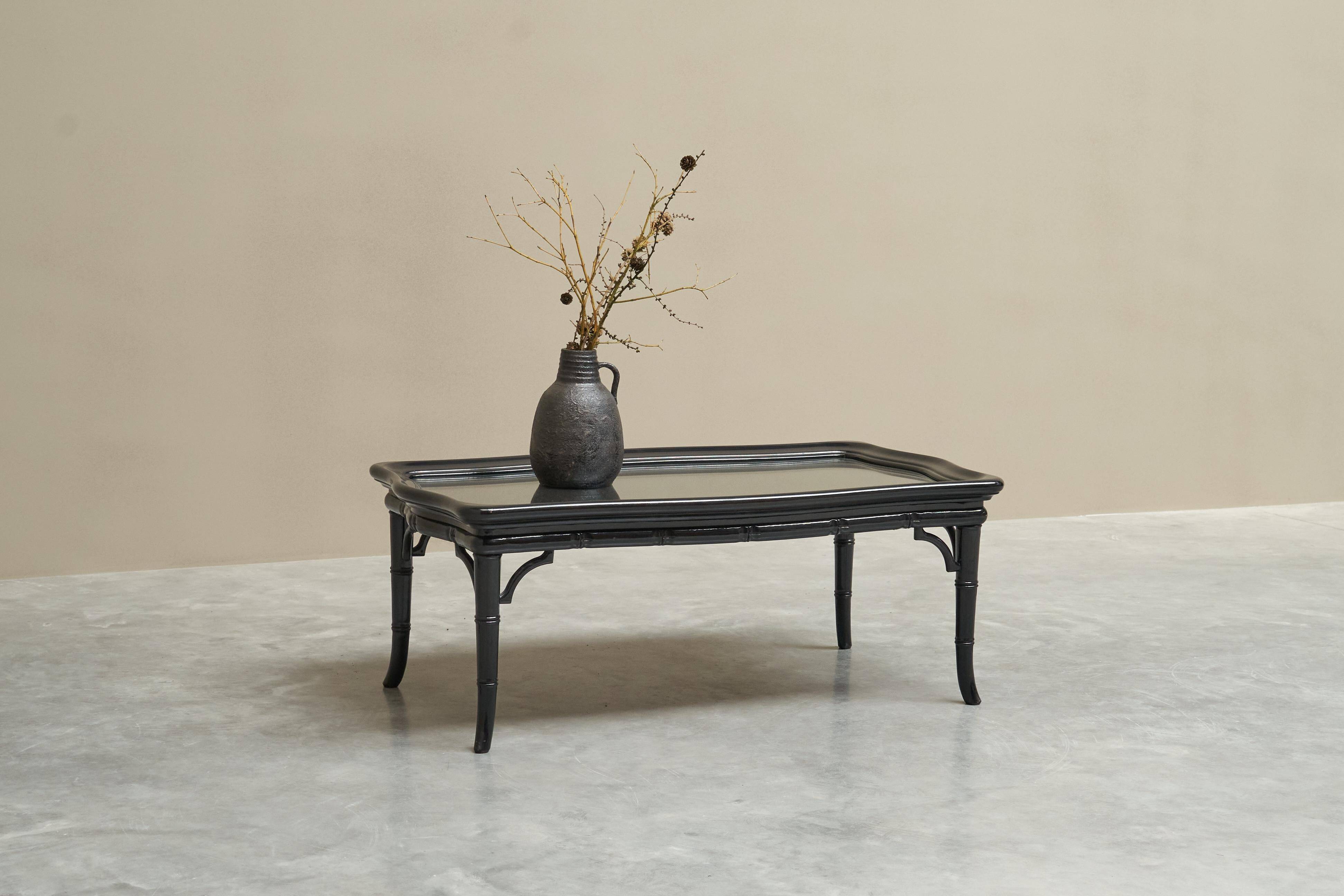 Coffee table in artificial bamboo, black lacquered wood and glass, 1960s.