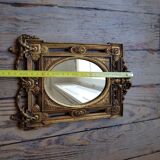 Old small golden mirror