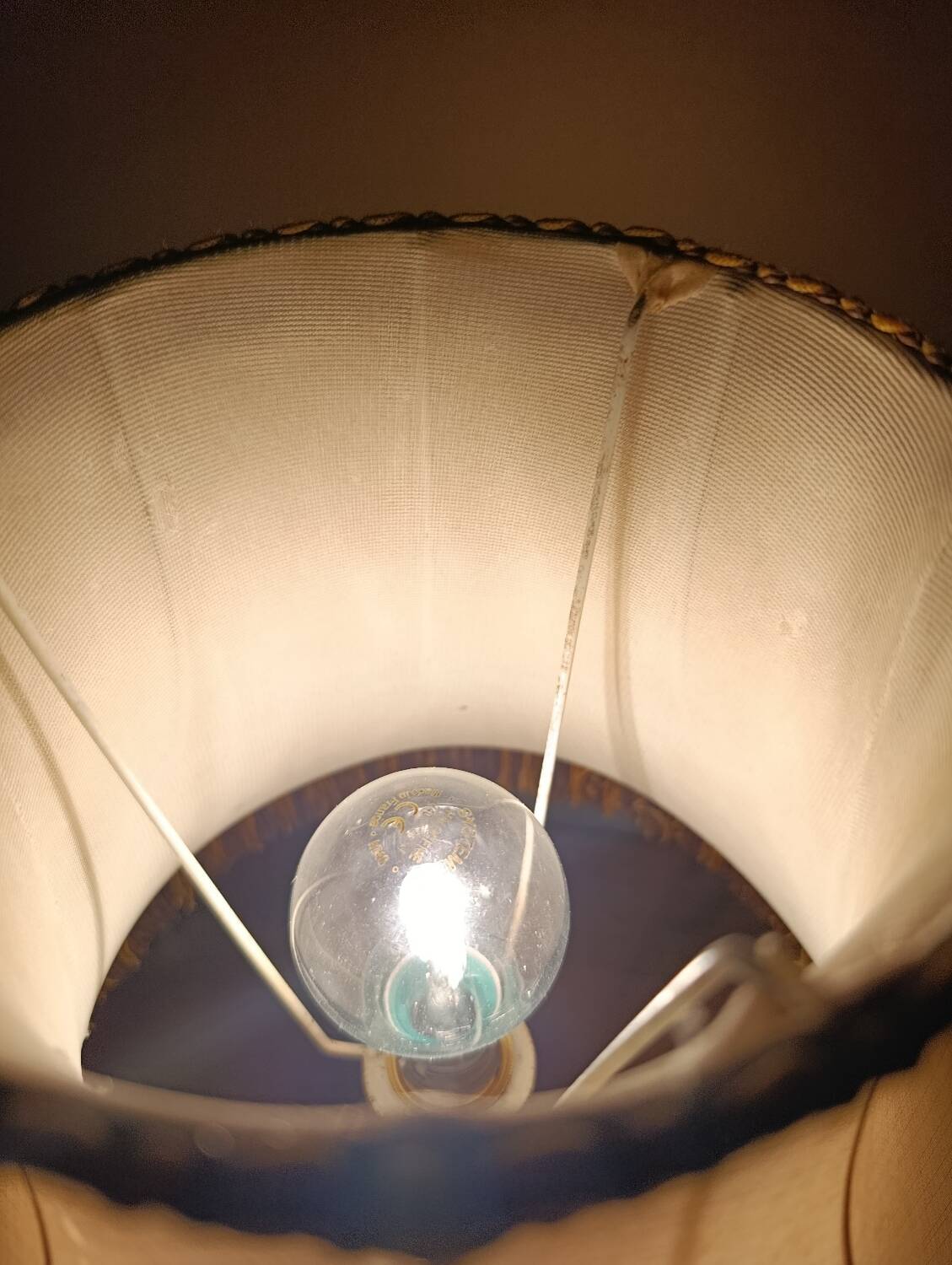 Chic retro lamp with a bronze pagoda fringe shade, 1950.