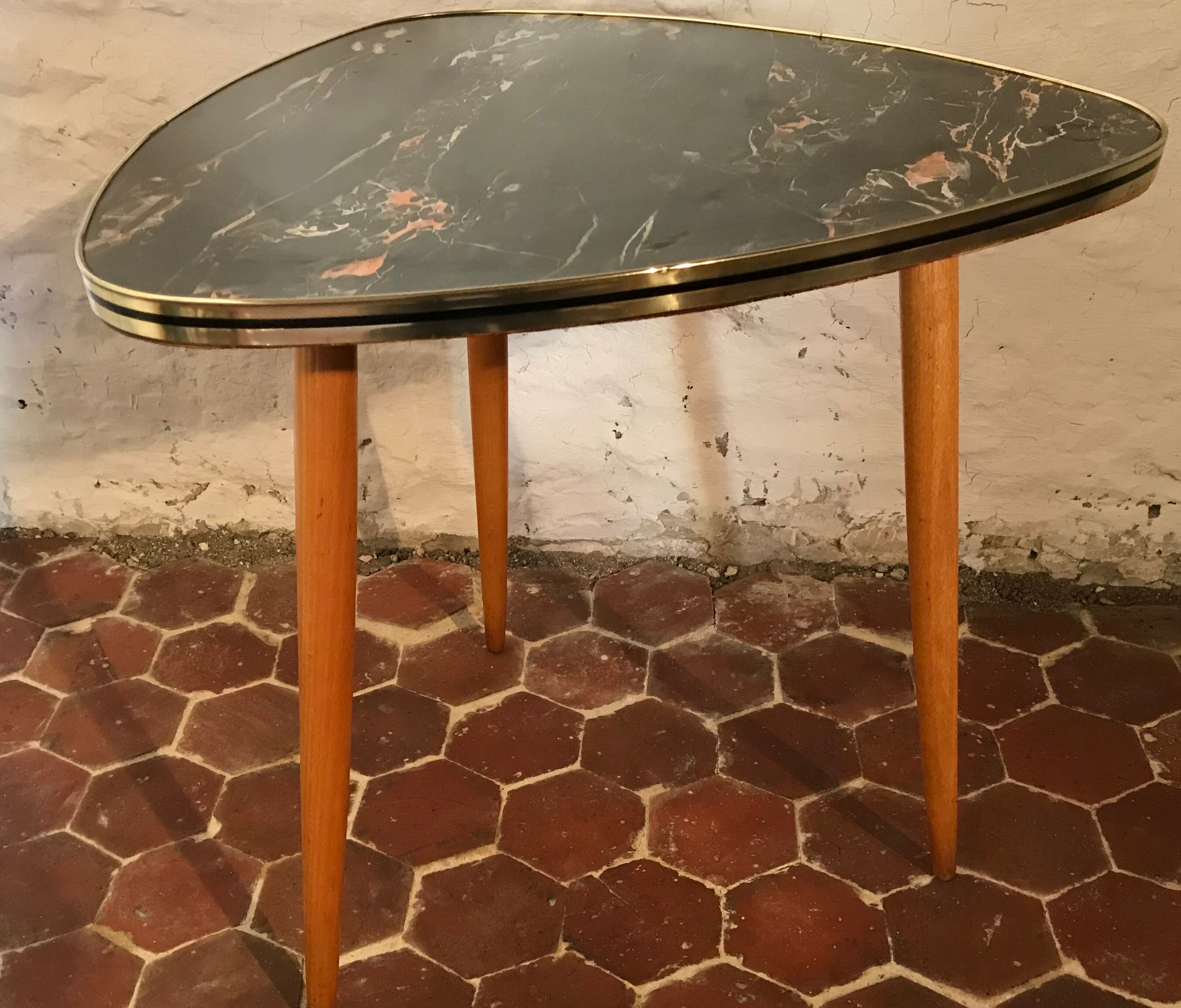 Free-form tripod coffee table