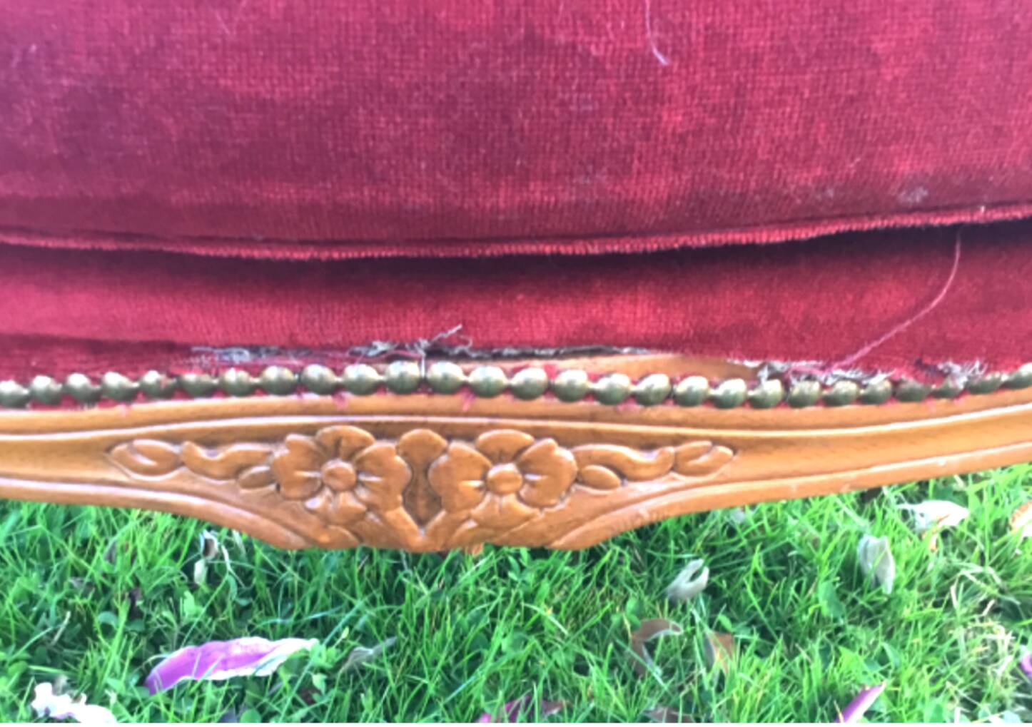Louis XV style carved wooden shepherdess chair. Red velvet
