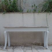 Console with a cotton grey patinated base, top in bleached walnut.