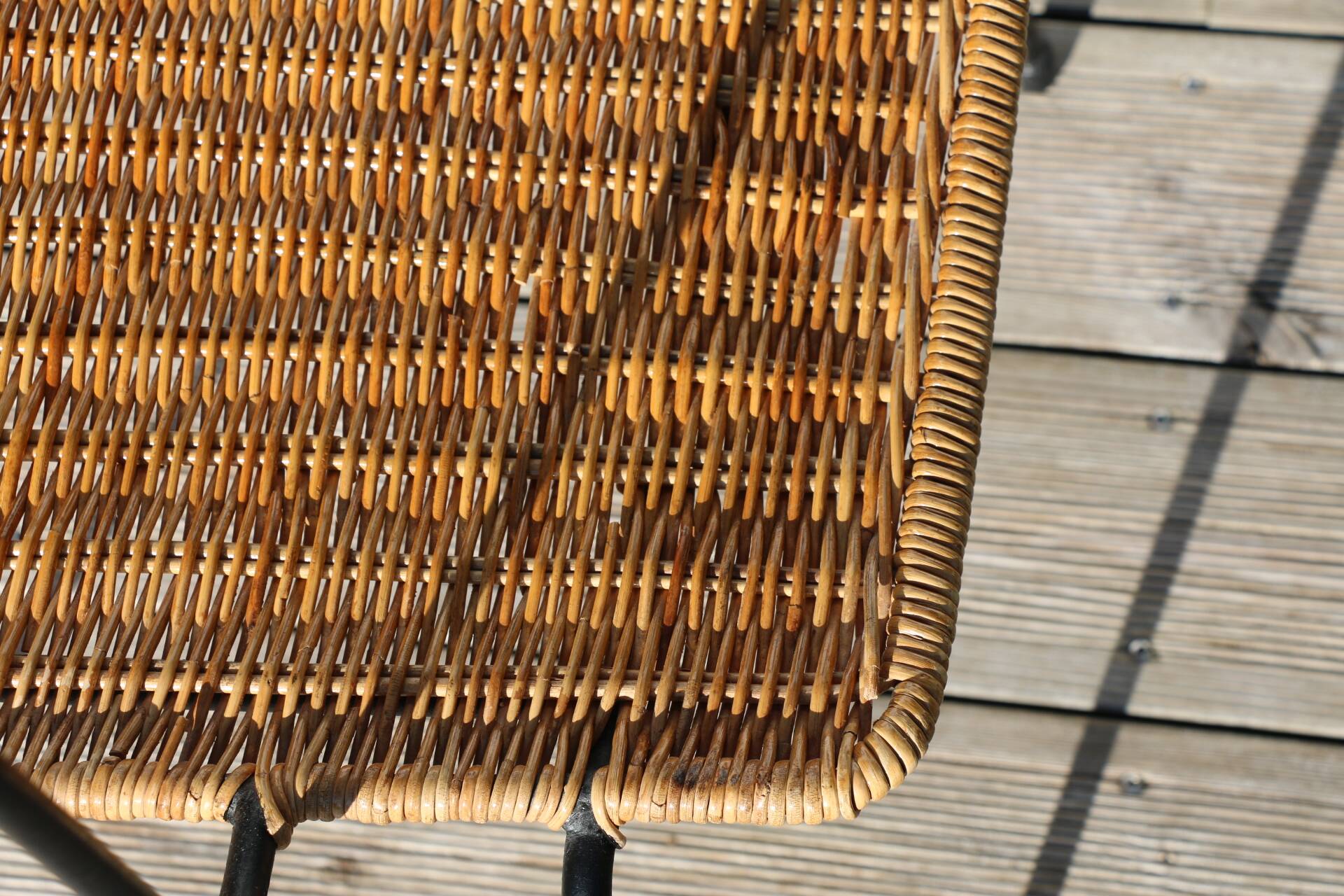 Rattan and steel armchair