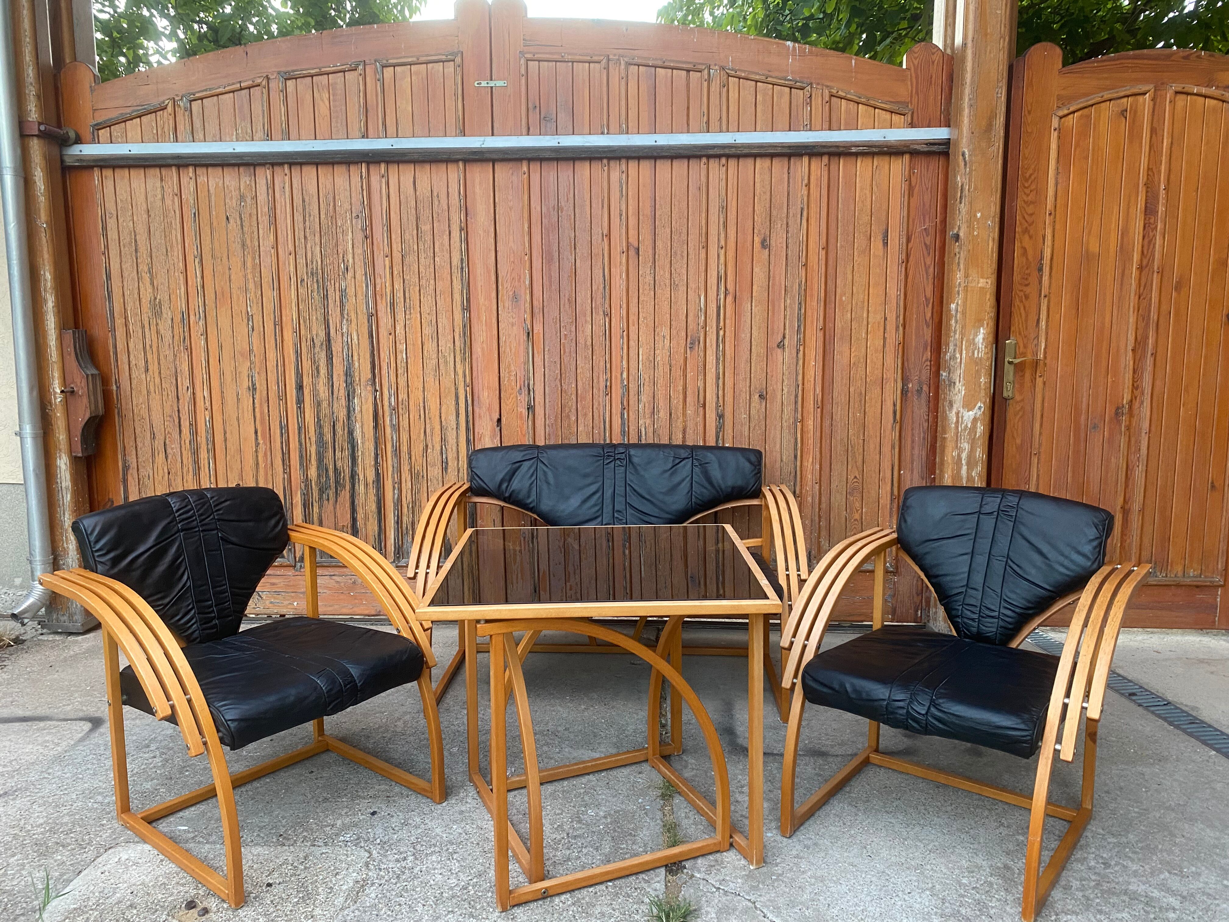 Mid-century leather sofa, 2 fotels, and table in sett