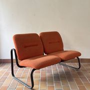 Strafor 2-seater bench, orange wool and sled base, 1970s.