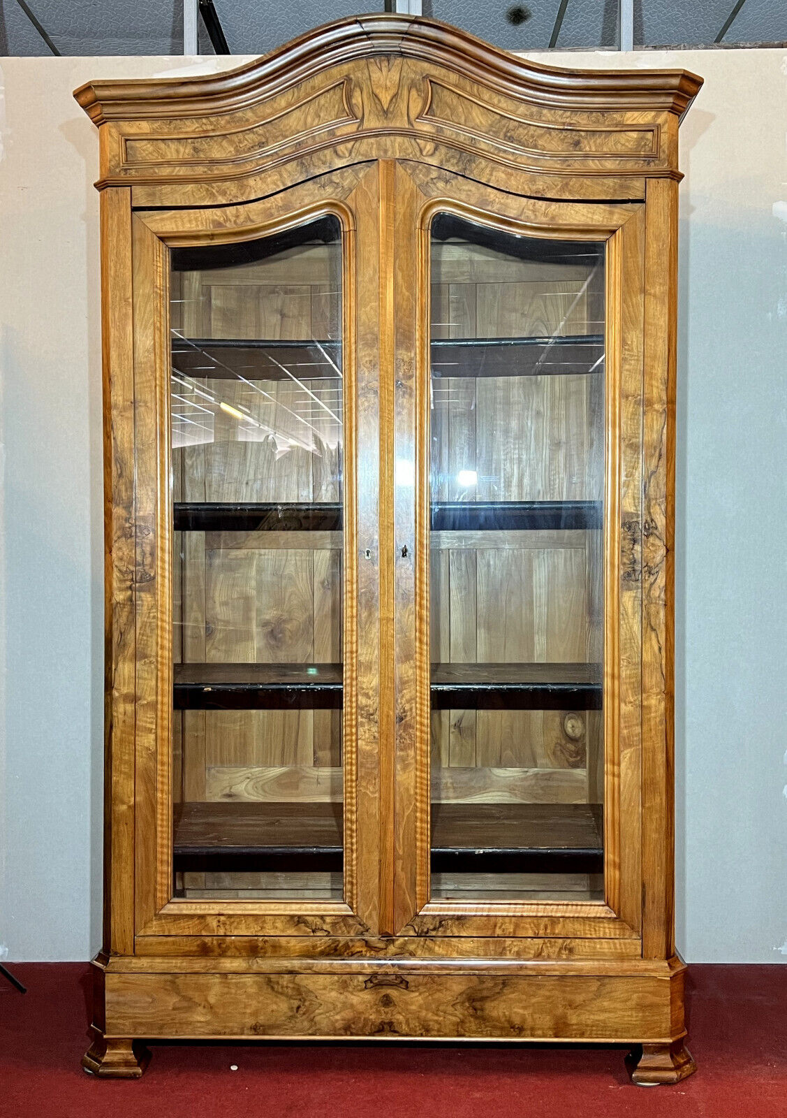 Library with gendarme's hat Louis Philippe era in blond walnut around 1830