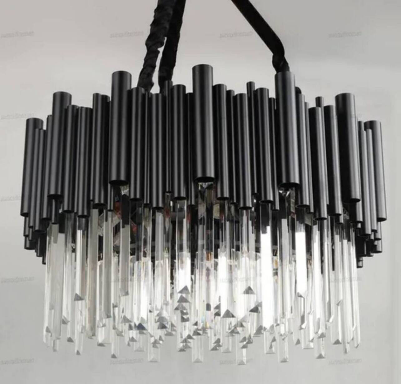 Modern designer chandelier in glass and metal