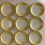 Yellow and white cups and saucers with gold trim Moulin des loups