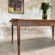 Vintage farmhouse table with spindle legs.