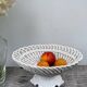 White woven ceramic fruit bowl